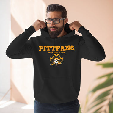 Man wearing a black hoodie with 'PITT FANS' text and logo indoors.