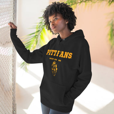 Person wearing a black hoodie with 'PITTFANS' text and design, standing indoors.