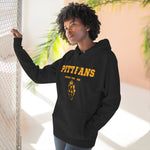 Person wearing a black hoodie with 'PITTFANS' text and design, standing indoors.